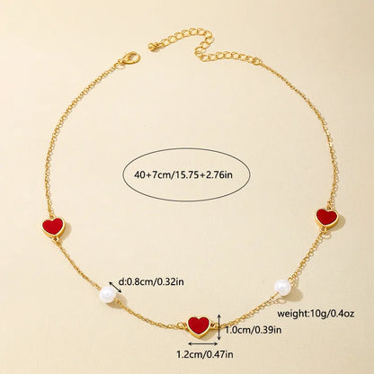 Women's Red Heart Pearl Station Necklace - View 4 | Hensley London