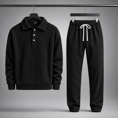 Men's Waffle-Knit Polo and Drawstring Trouser Set in Black – front view of set | Hensley London