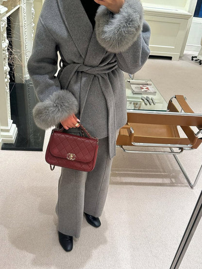 Women's Belted Shawl-Collar Coat with Textured Cuffs in Grey – front worn view | Hensley London