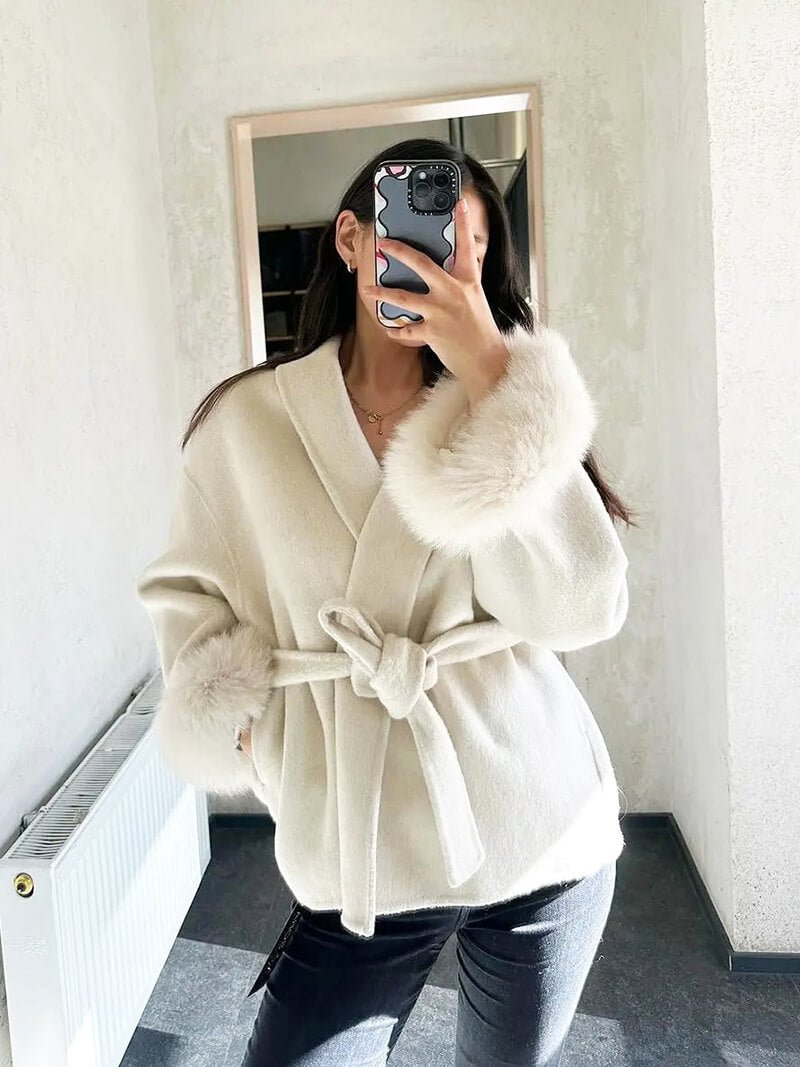 Women's Belted Shawl-Collar Coat with Textured Cuffs in Beige – front worn view | Hensley London
