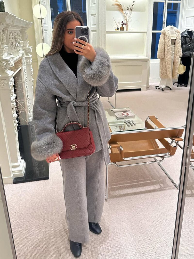 Women's Belted Shawl-Collar Coat with Textured Cuffs in Grey – front worn view | Hensley London