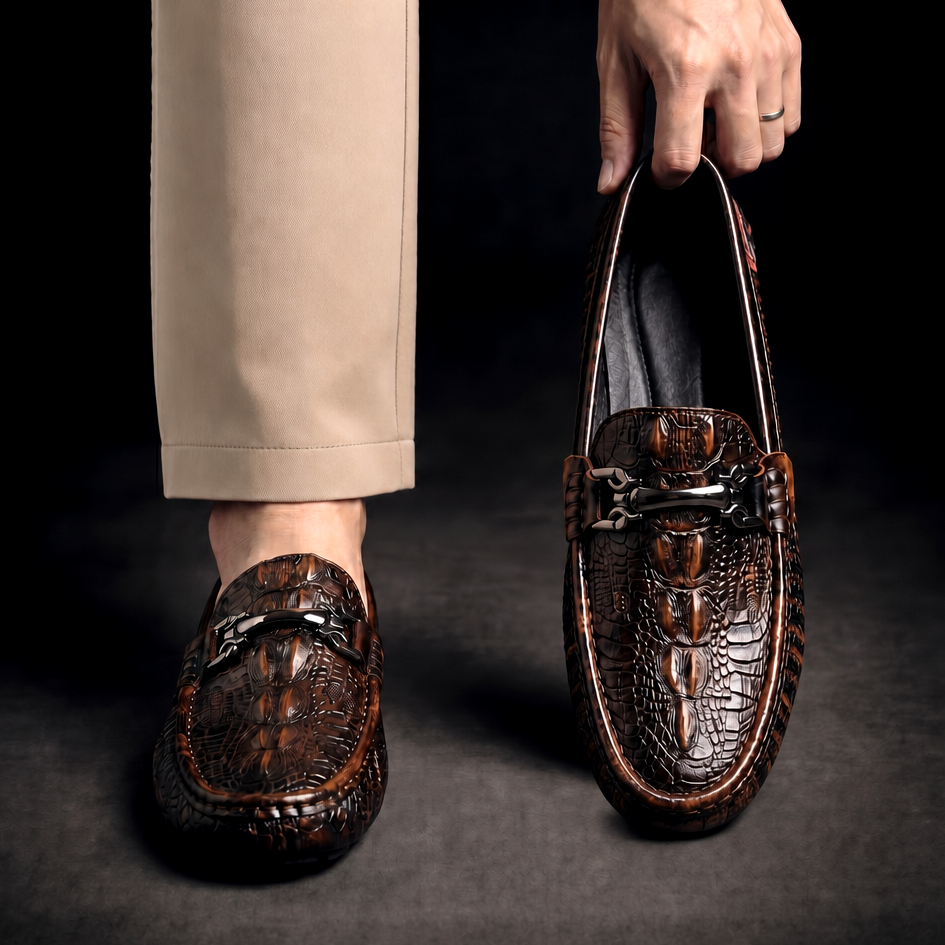 Men's Croc-Effect Bit Loafers in Brown – worn and held front view | Hensley London