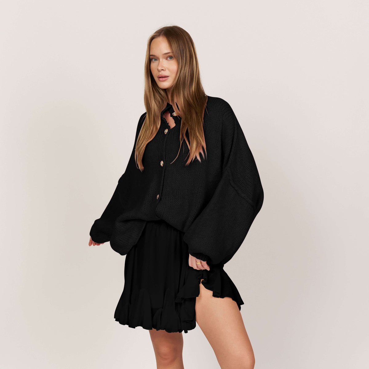 Women's Oversized Knit Cardigan – Gold-Tone Buttons in Black – side view | Hensley London